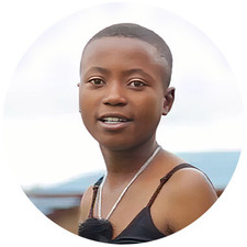 Headshot of Esperance, a sponsor child of Food for the Hungry Rwanda