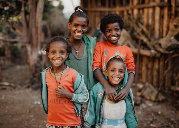 four beautiful girls smiling